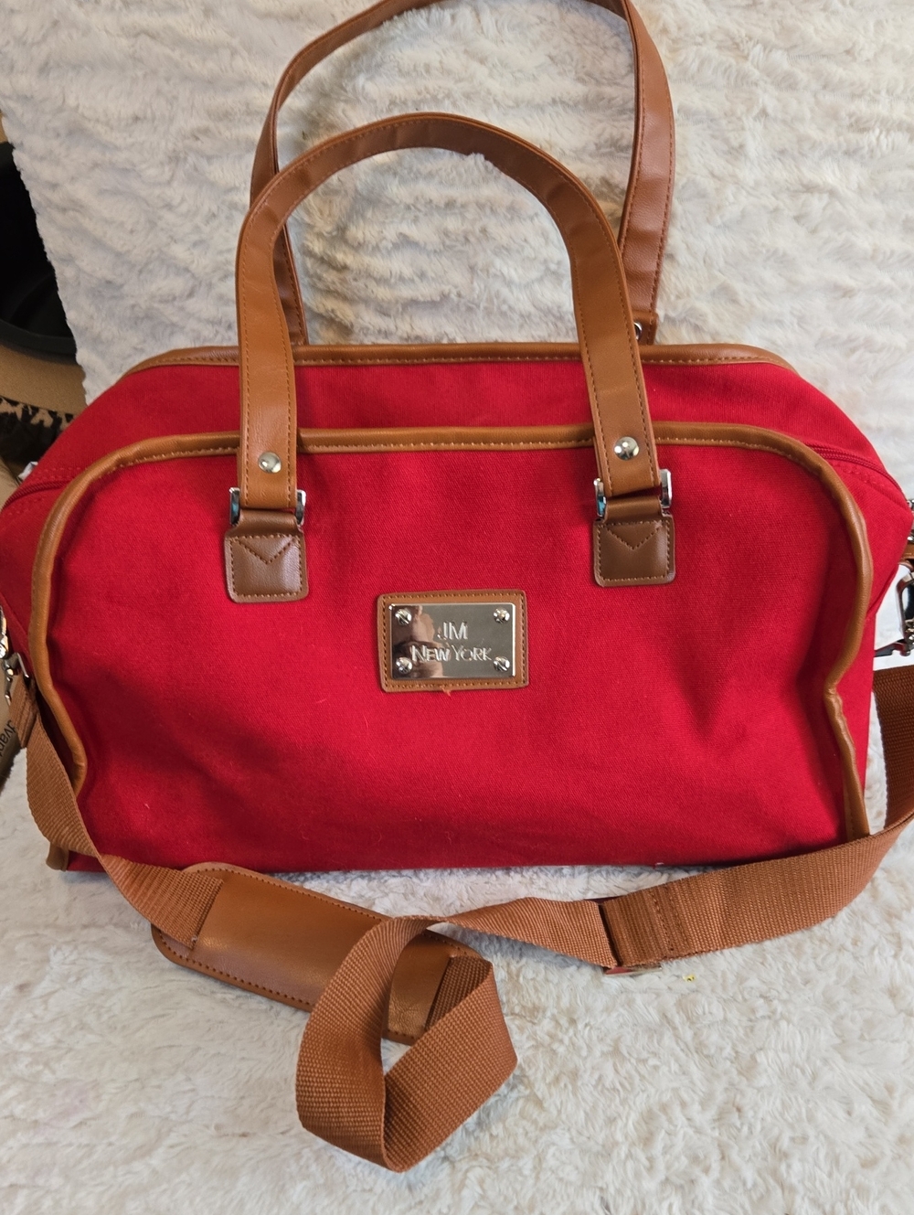JM New York Red Canvas Bag with Tan Trim and Metal Plaque